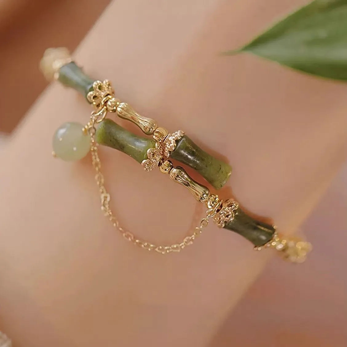 Women's plum wine coloured glaze bamboo joint bracelet with baking varnish finish.