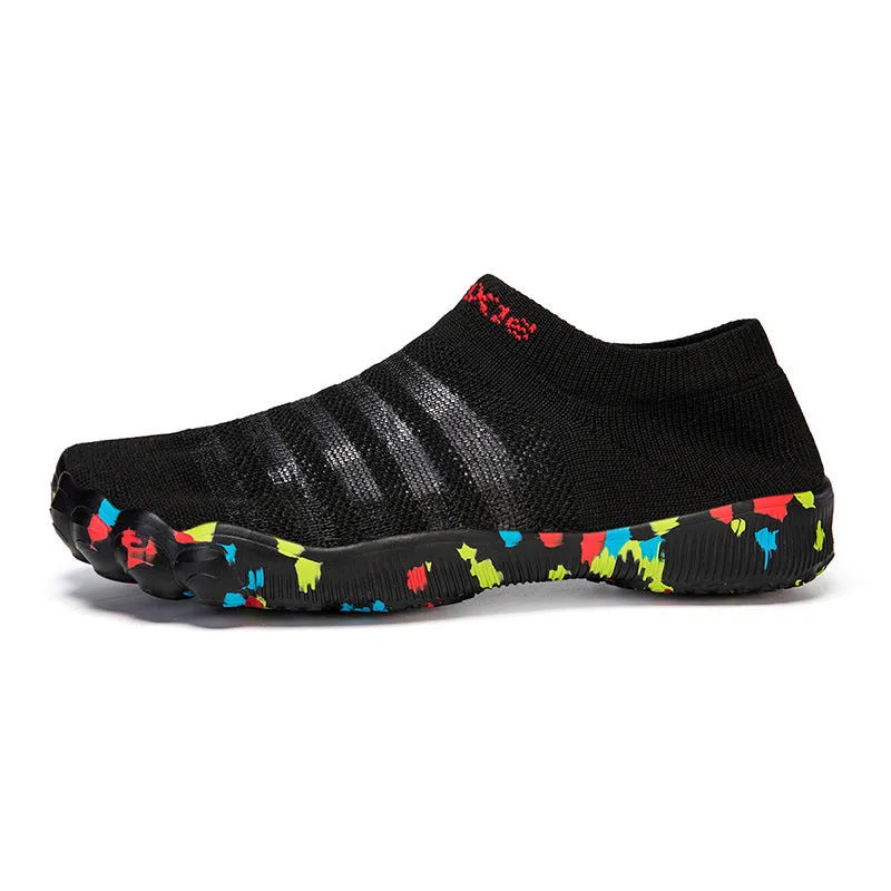 Men's lace-up flyknit water shoes in camouflage colour on a sandy beach