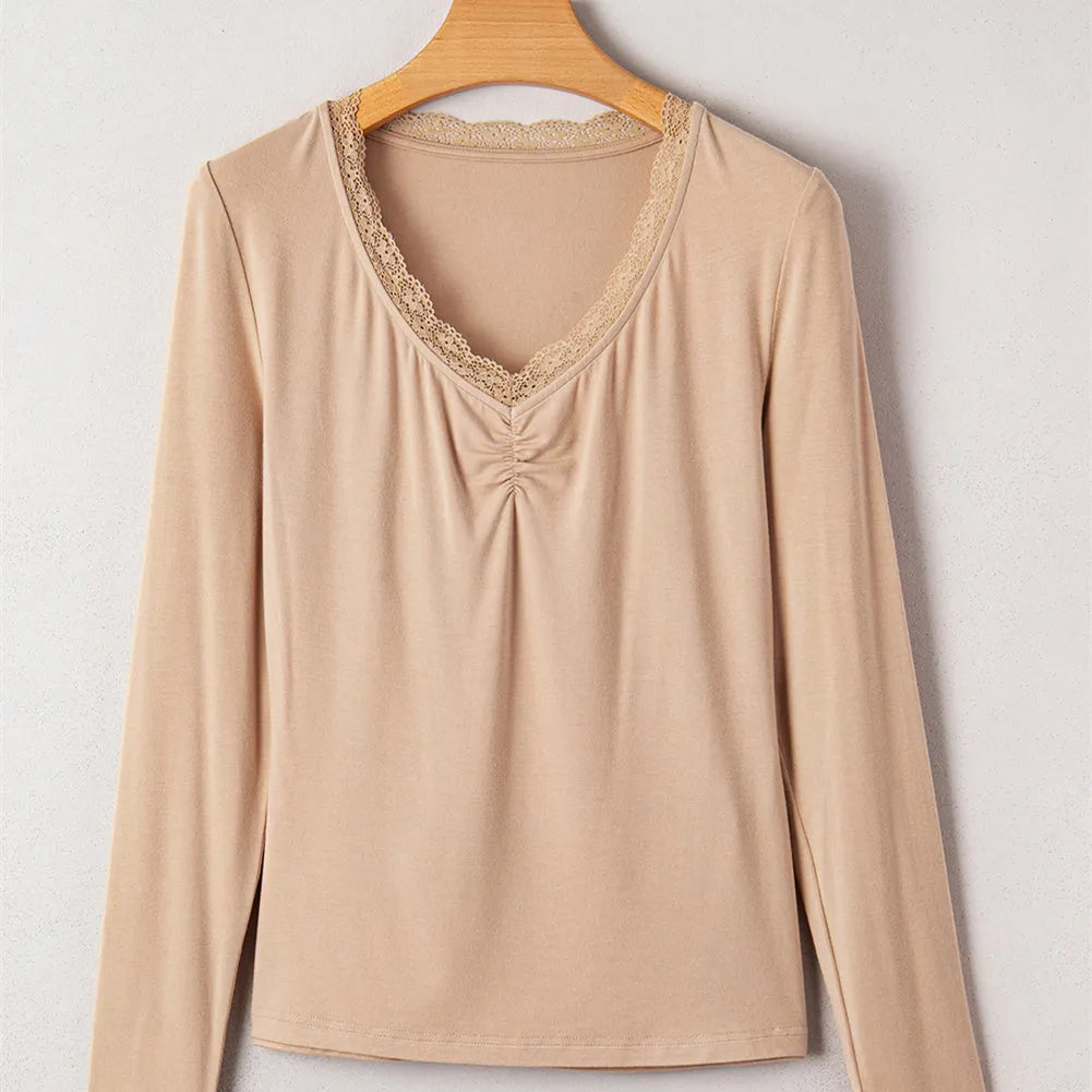 Women's solid colour long sleeve casual top with lace trim detail in slim fit silhouette
