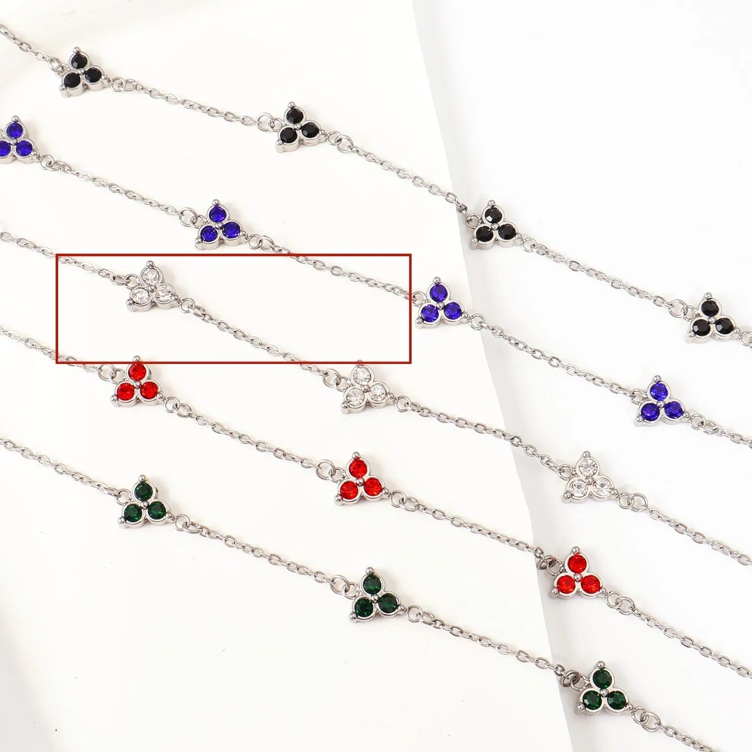 Women's stainless steel bracelet with three geometric diamond designs in various colour options