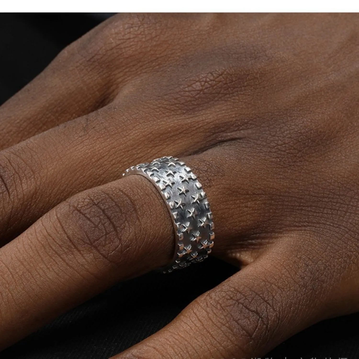 Adjustable silver ring with geometric five-pointed star pattern in 925 sterling silver