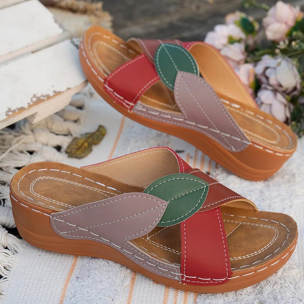 Women's red-brown cork wedge sandals with leaf design and gladiator lace-up ankle strap