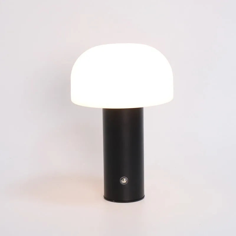Creative plastic table lamp with USB and plug-in power options in black, white, orange, or green.