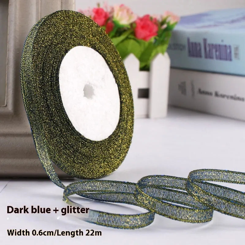 Roll of 0.6cm wide coloured polyester gift ribbon with 22 metre length.