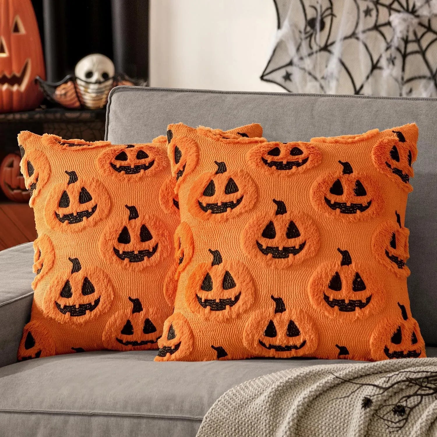 Plush stereo ghost embroidered black and white holiday decorative cushion cover 45x45cm on sofa