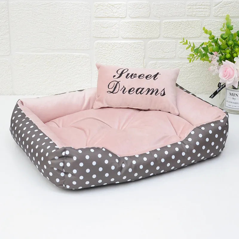 Polka dot printed square nest dog bed with removable embroidery pillow in grey, blue, pink, or red.