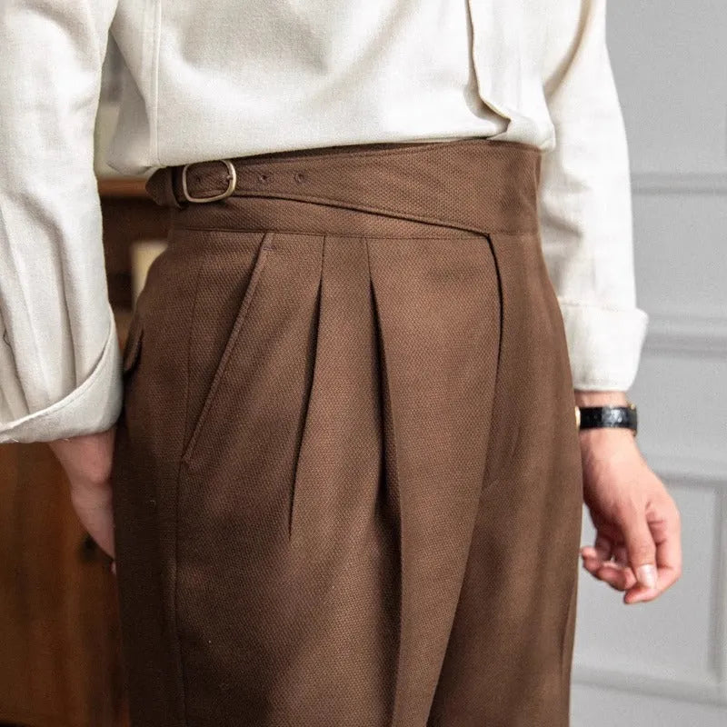 Man wearing black high-waisted straight-leg casual polyester trousers.