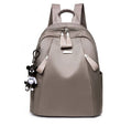 Medium wild fashion rucksack in Oxford cloth with vertical square shape, double straps, and zipper closure available in black, gray and wine red