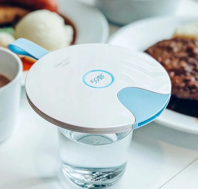 Portable UV baby bottle sterilizer showing compact design with USB port and measuring 163.6mm x 120mm