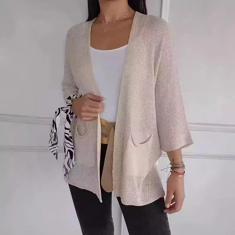 Women's thin waffle weave cardigan coat in army green with nine-quarter sleeves and pockets.