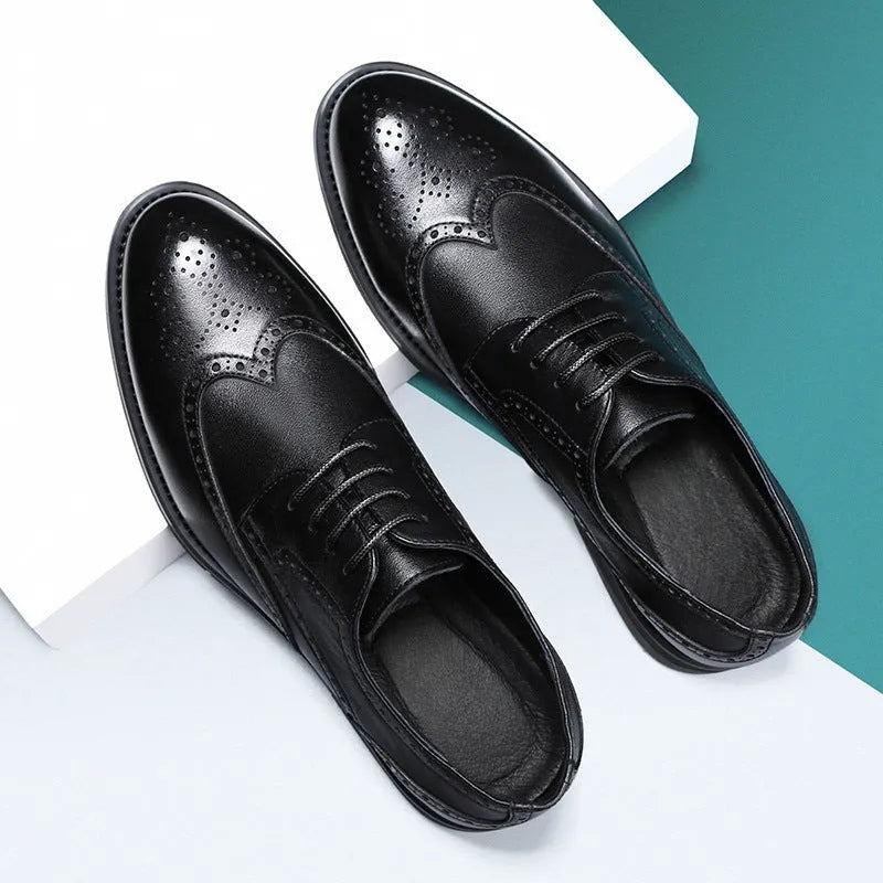 Men's black brogue leather shoes with traditional perforations and Oxford-style construction
