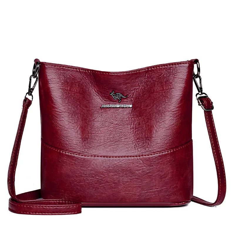 Women's large capacity soft leather shoulder bag in bucket style with sandwich pocket