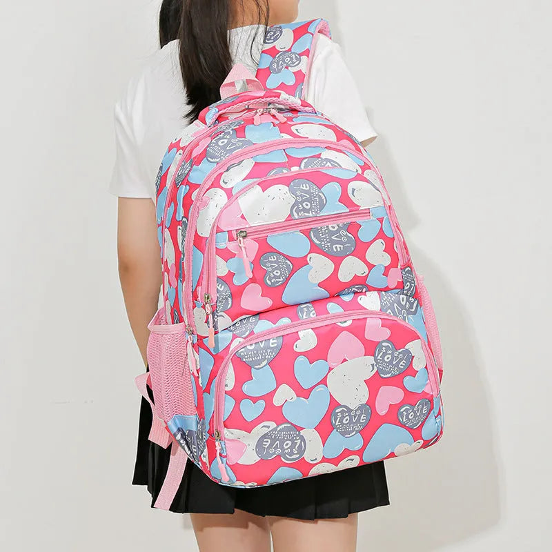 Blue student backpack with air cushion shoulder straps, large main compartment and Oxford cloth material.
