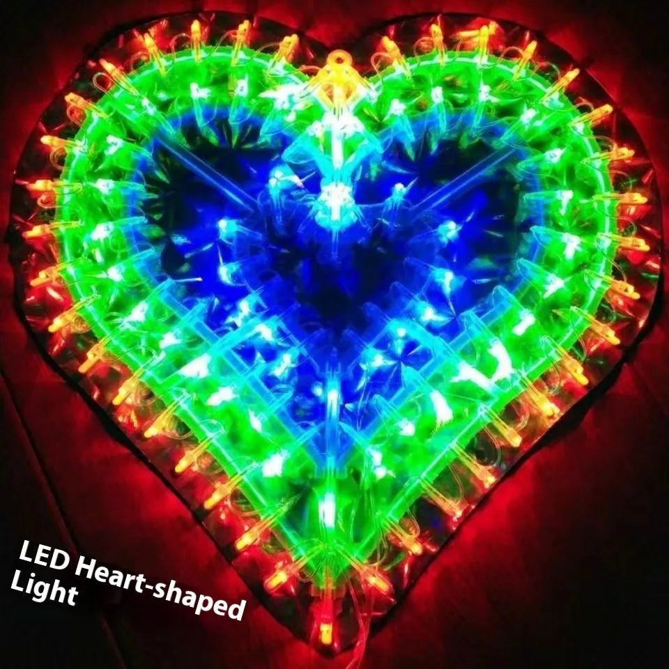 Outdoor festive string lights showing peacock, love heart, sunflower, and star shapes.