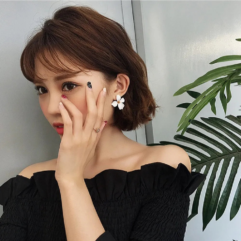 Flower stud earrings for women in alloy with white and pink electroplated colour options
