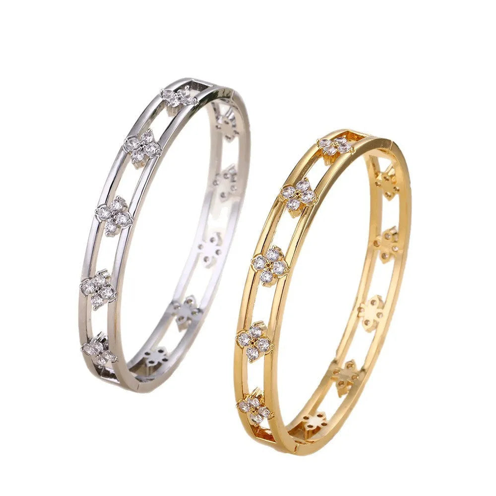 Gold or silver hollow women's bracelet with four-leaf clover design and zircon crystals
