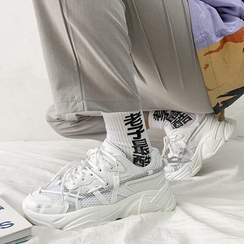 Men's white platform dad sneakers with lace-up front and chunky sole for height increase.