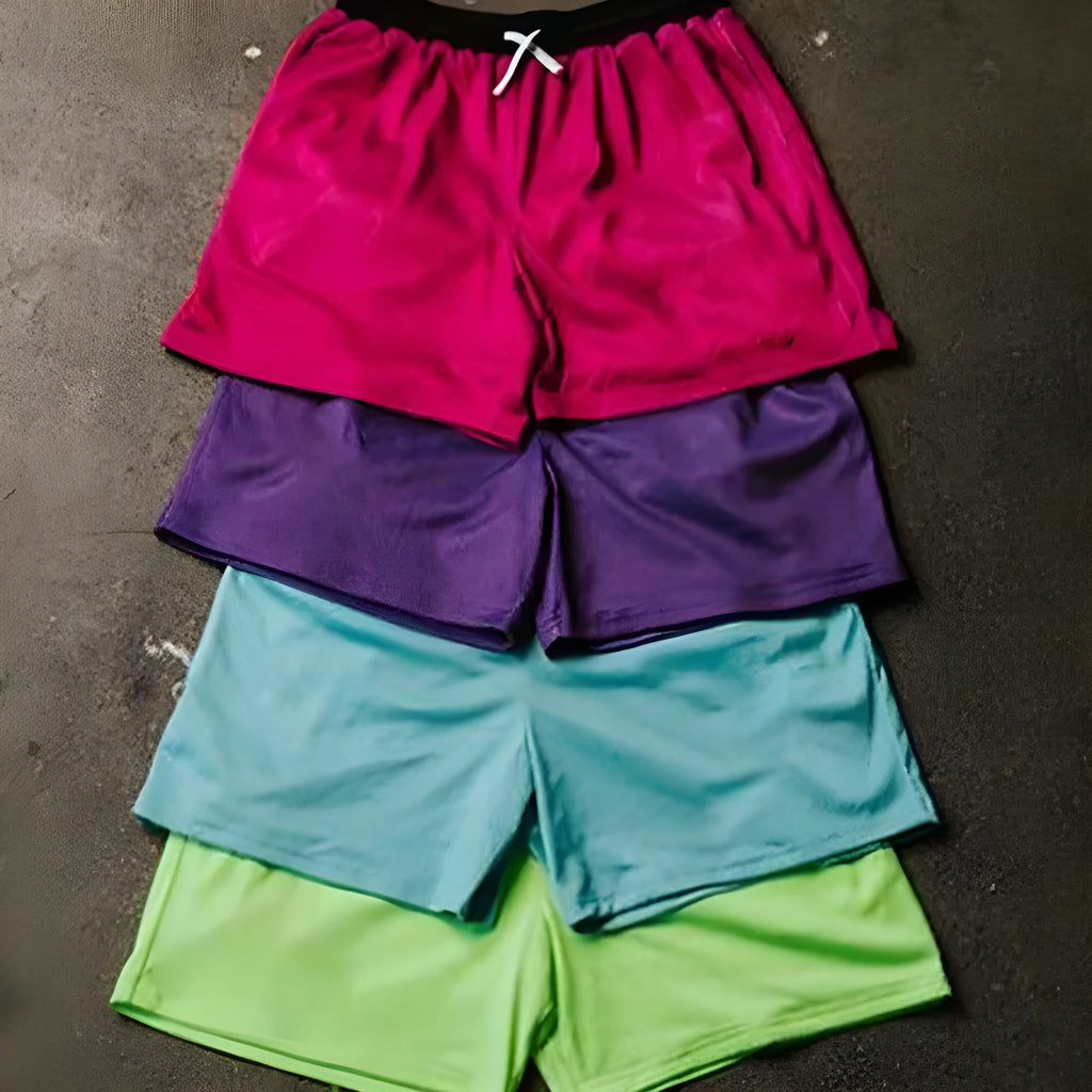 Men's mesh quick-drying shorts in solid colours for running and fitness.