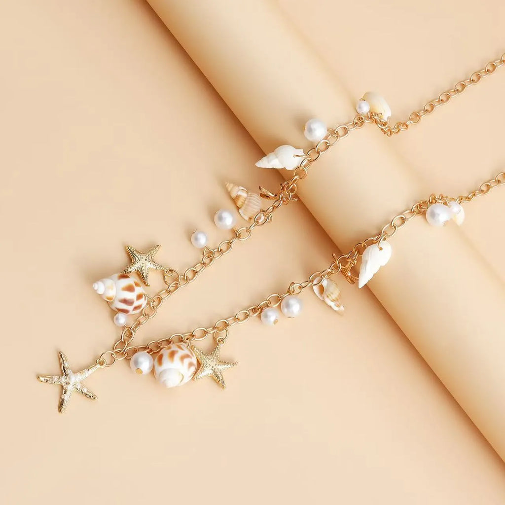 Women's waist chain and matching bracelet jewellery set with star motif design in alloy material