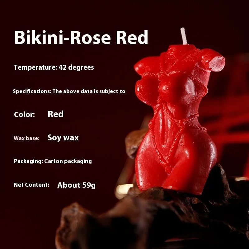Low temperature soy wax candle in bikini shape, colour options: red, pink, purple.