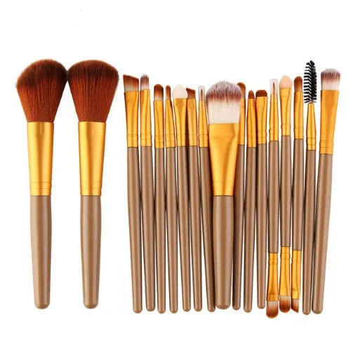 18-piece makeup brush set with fan brushes arranged on a table.