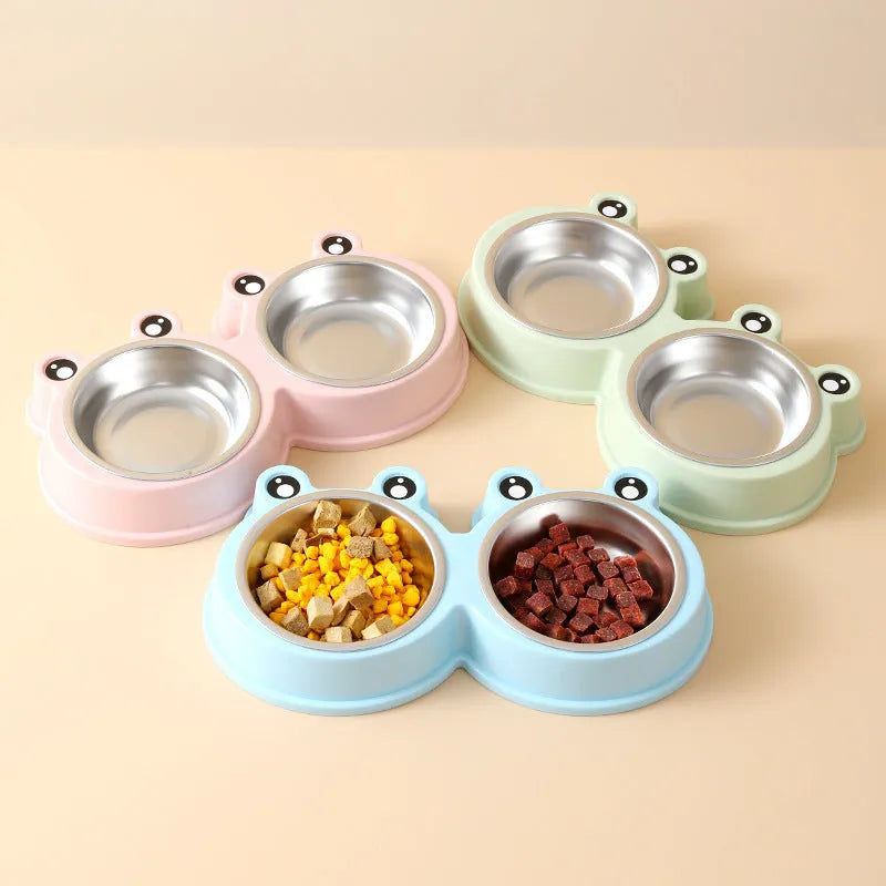 Stainless steel double pet bowl set with anti-slip frog base in blue, for cat or dog food and water.