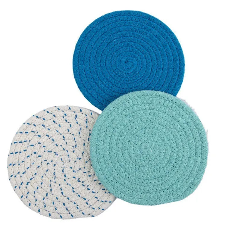 Cotton cord round coaster set showing three 18cm diameter placemats in modern colour options