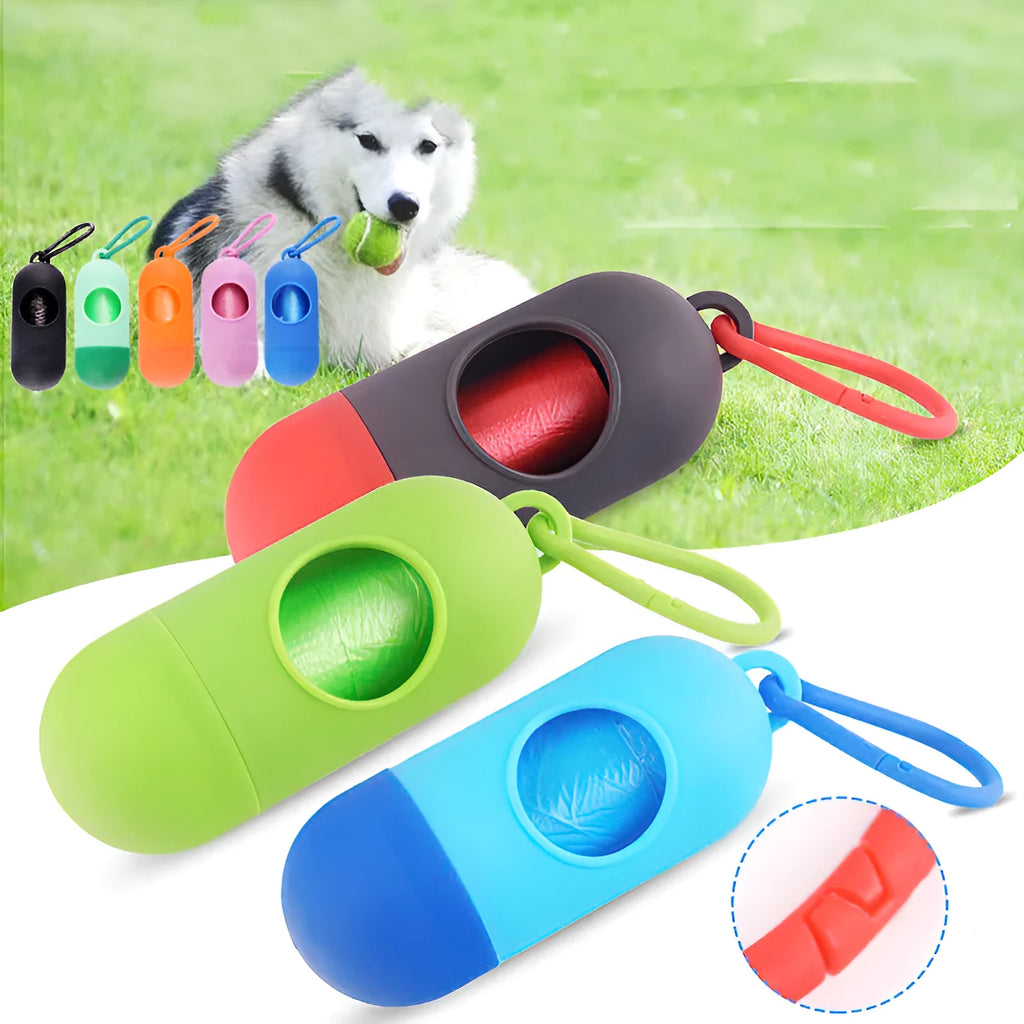 Compact black dog poop bag holder with hook and Velcro strap, shown attached to a pair of trousers.