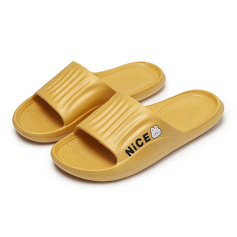 Adult unisex EVA bathroom slippers with cartoon pattern and non-slip sole in multiple colour options