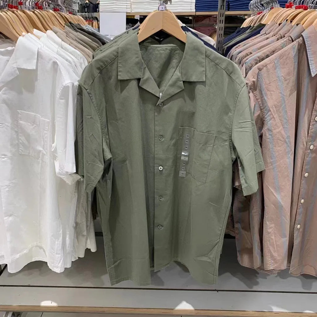 Men's beige modal cotton open collar casual shirt with regular sleeves on a hanger