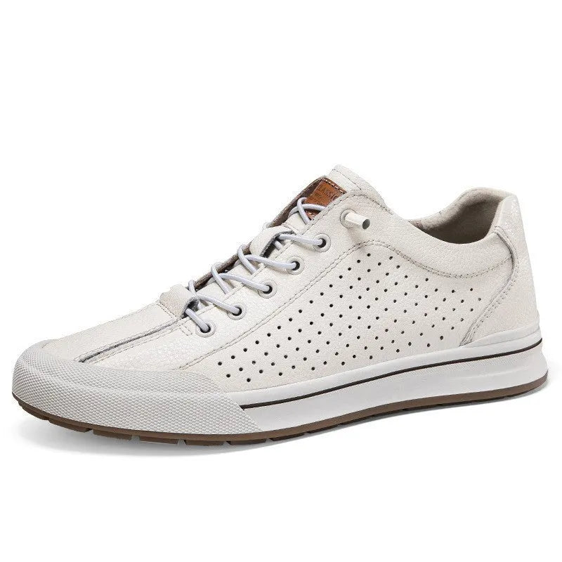 Men's white matte leather casual shoes with breathable hollow-out design and flat heel.