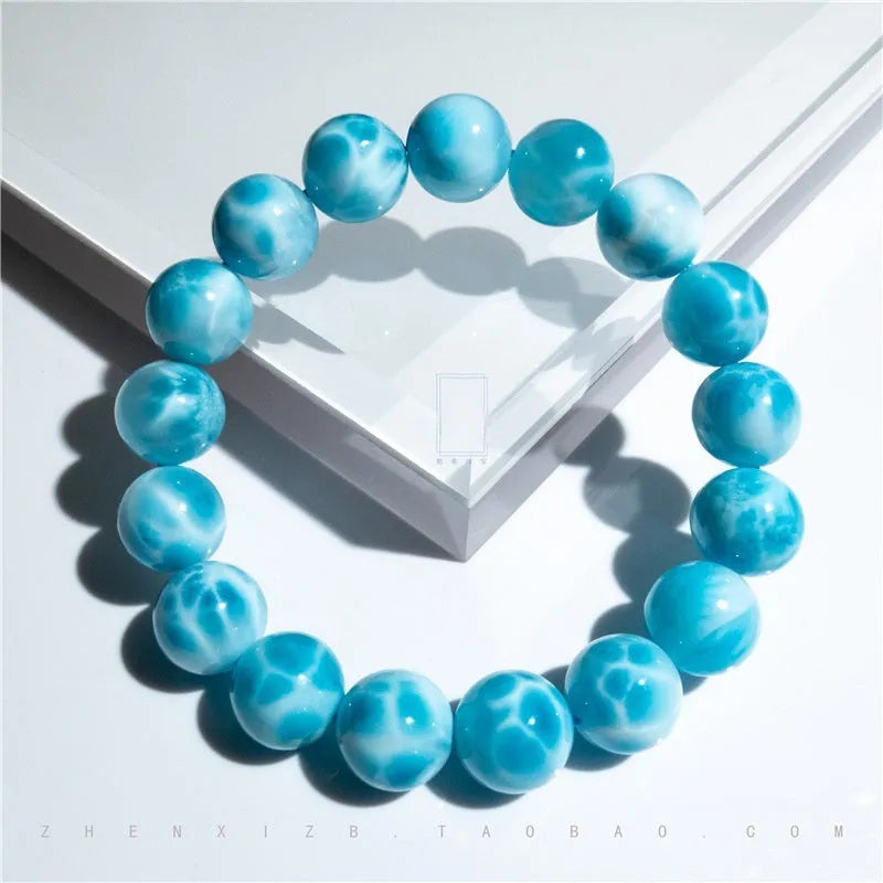 Blue Bodhi bead bracelet with natural crystal stone and pearl accents in Maillard style