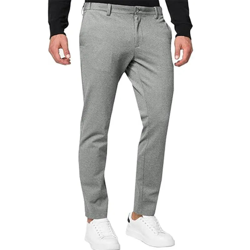 Men's slim-fit tapered chino trousers in solid colours with mid-waist and zipper fly