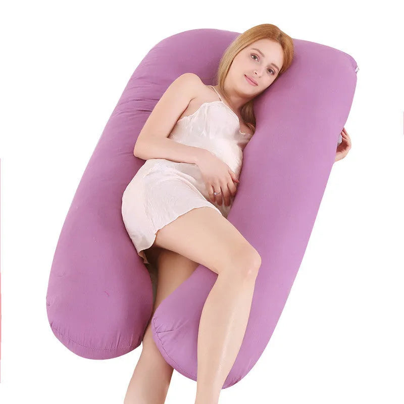 Large U-shaped pregnancy support pillow with removable cover in choice of fabrics.