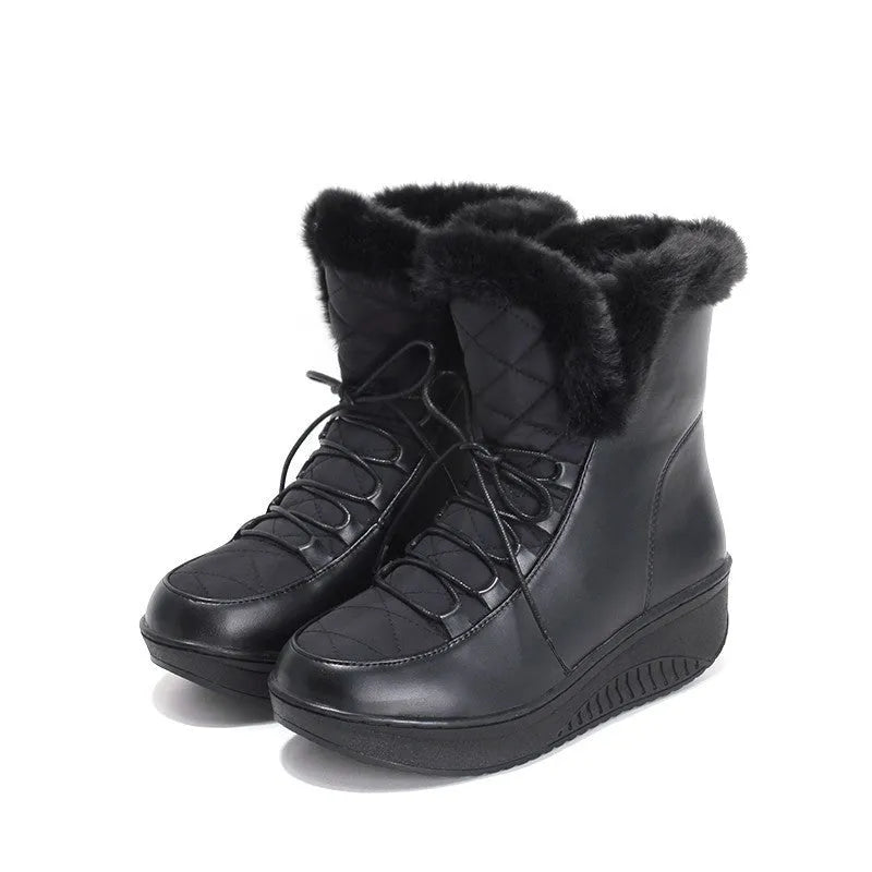 Women's black platform winter boots with lace-up front and water-resistant PU leather.