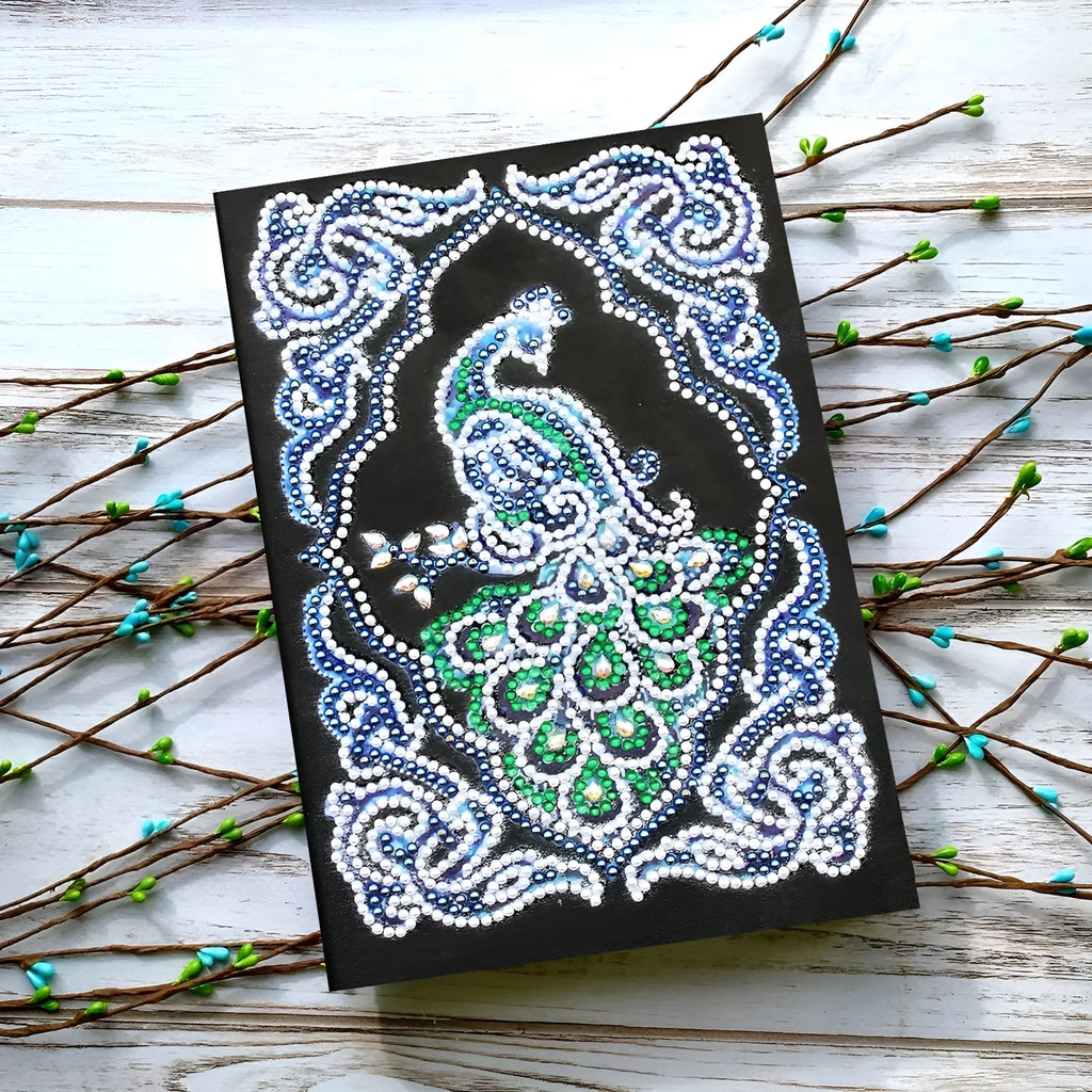 Black A5 diamond painting notebook with peacock design featuring shaped and bright drill rhinestones
