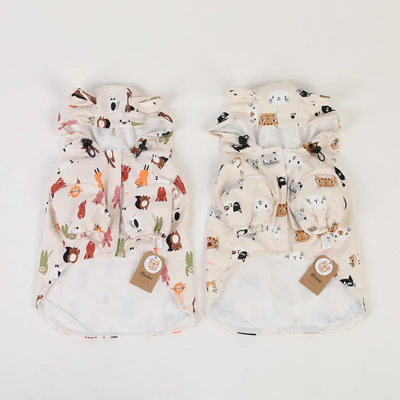 Beige dog raincoat with cartoon design featuring double waterproof PU coating