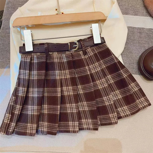 Girls plaid pleated A-line skirt in cotton blend fabric on hanger.