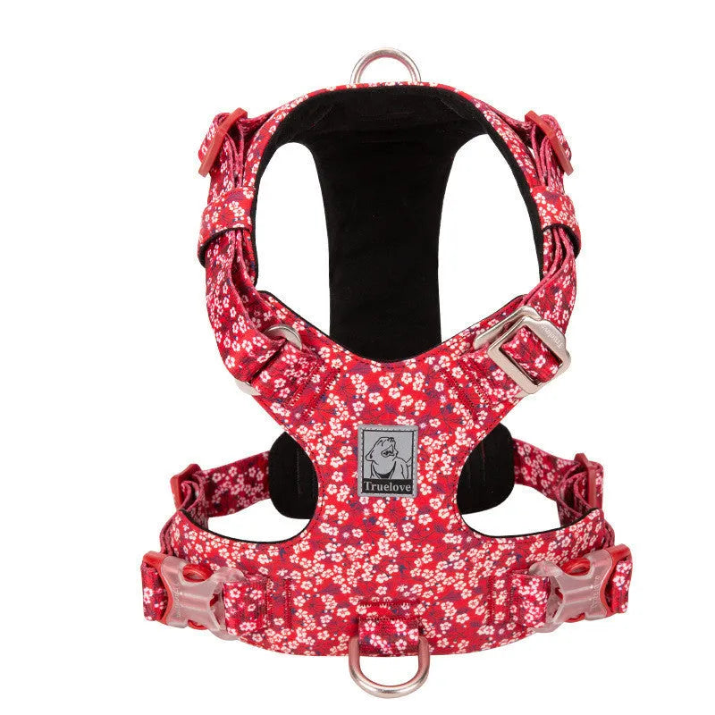 Cotton pet harness with chest strap in floral pattern, showing size adjustment points
