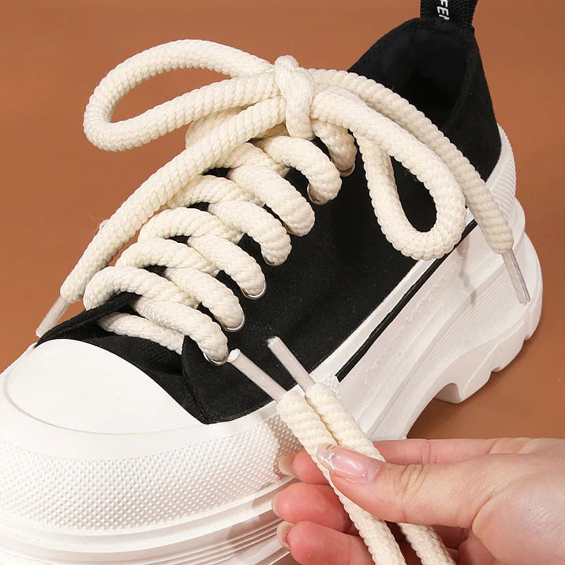 Round woven shoelaces in white, beige, and black colours showing different thickness and length options.