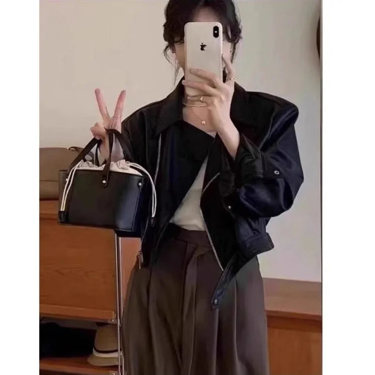 Women's brown retro leather coat jacket with slim fit and pocket detailing