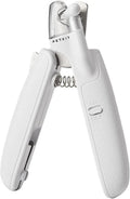 White pet nail clippers with LED light, anti-splash guard, and a nail file on a table.