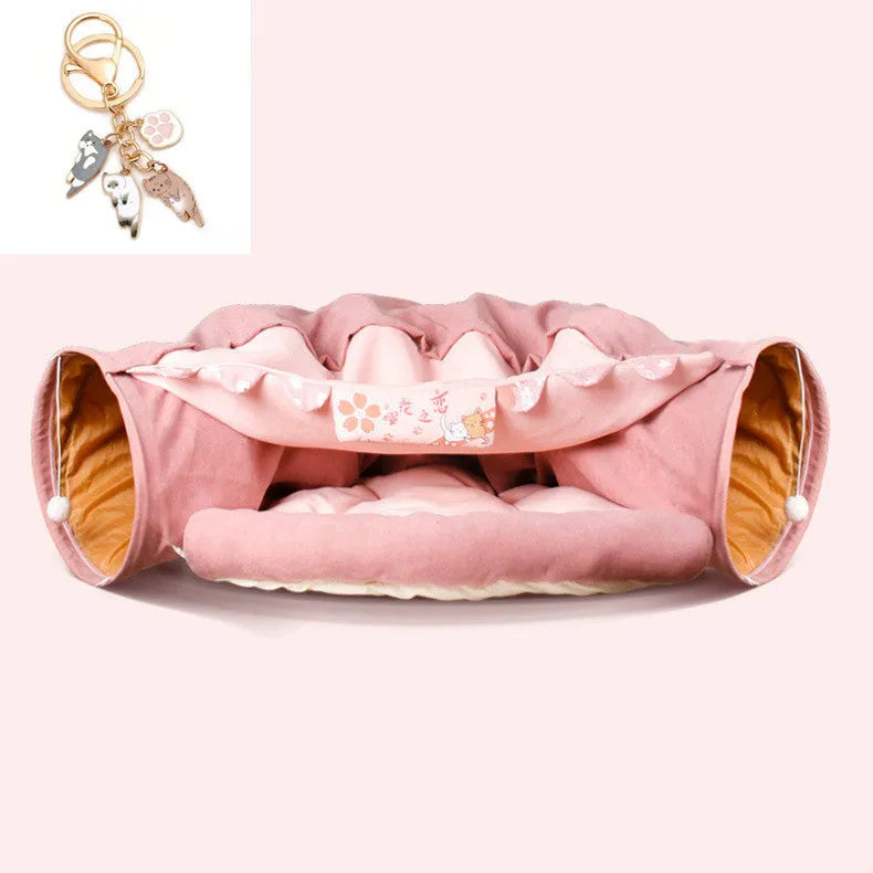 Collapsible cloth cat tunnel for play, shown in one of four colours: Bar, Coffee, Matcha, or Pink.