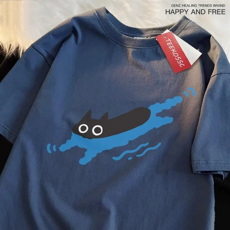 A plus-size woman's black short sleeve cotton T-shirt with a diving cat graphic, shown in a straight cut fit.