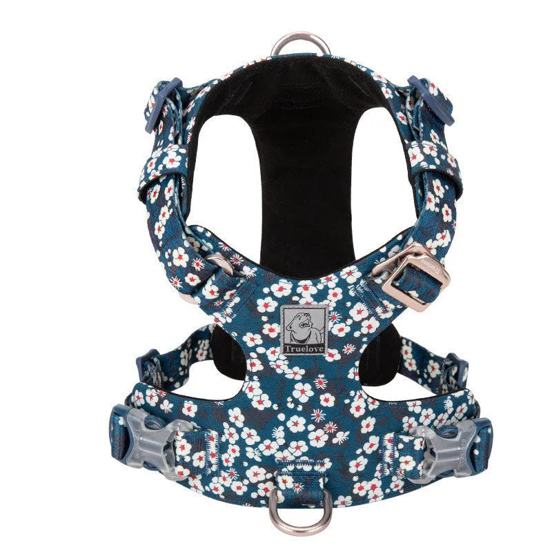 Cotton pet harness with chest strap in floral pattern, showing size adjustment points
