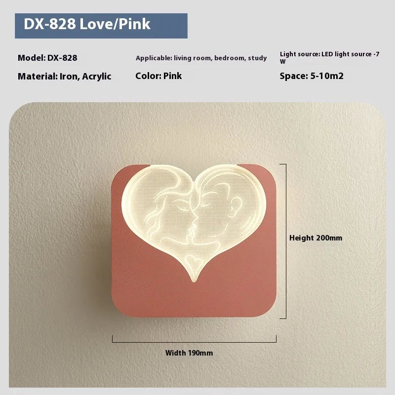 Modern bedside lamp with an acrylic shade showing a love heart motif and three-colour LED light.