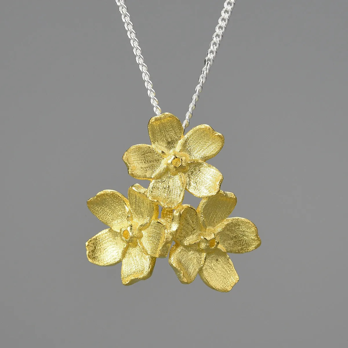Myosotis Sylvatica sterling silver floral pendant with pastoral design in gold or silver electroplated finishes