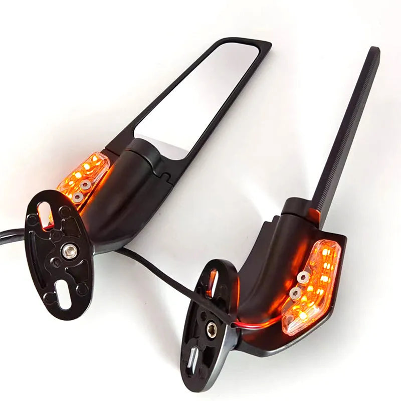 Pair of spoiler-shaped motorcycle rearview mirrors with yellow LED lights and convex lenses.