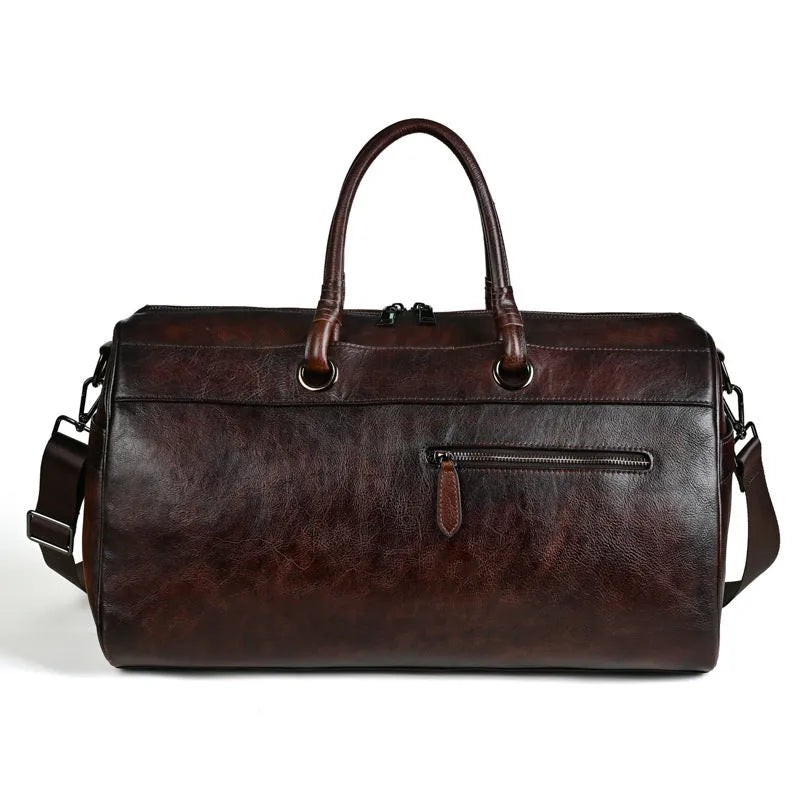 Handmade retro leather bag in vintage brown with large capacity.