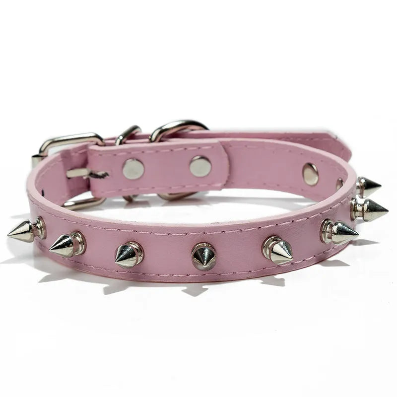 A spiked dog collar made of black PU leather with metal studs and an alloy metal buckle.